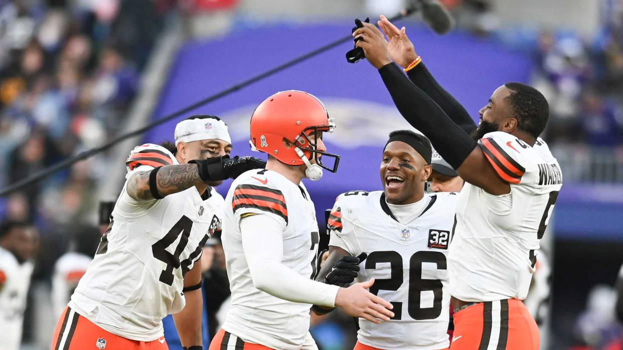 Cleveland Browns linebacker Anthony Walker Jr. (5) places a crown on place kicker Dustin Hopkins (7) head after kicking the game winning field goal against the Baltimore Ravens at M&T Bank Stadium.