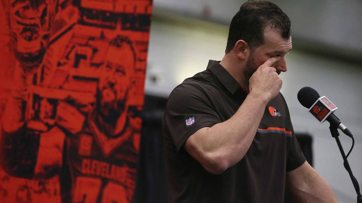 Cleveland Browns offensive tackle Joe Thomas wipes away a tear after learning the beat writers renamed the player of the year award the Joe Thomas award during his retirement press conference at the Cleveland Browns training facility on Monday, March 19,