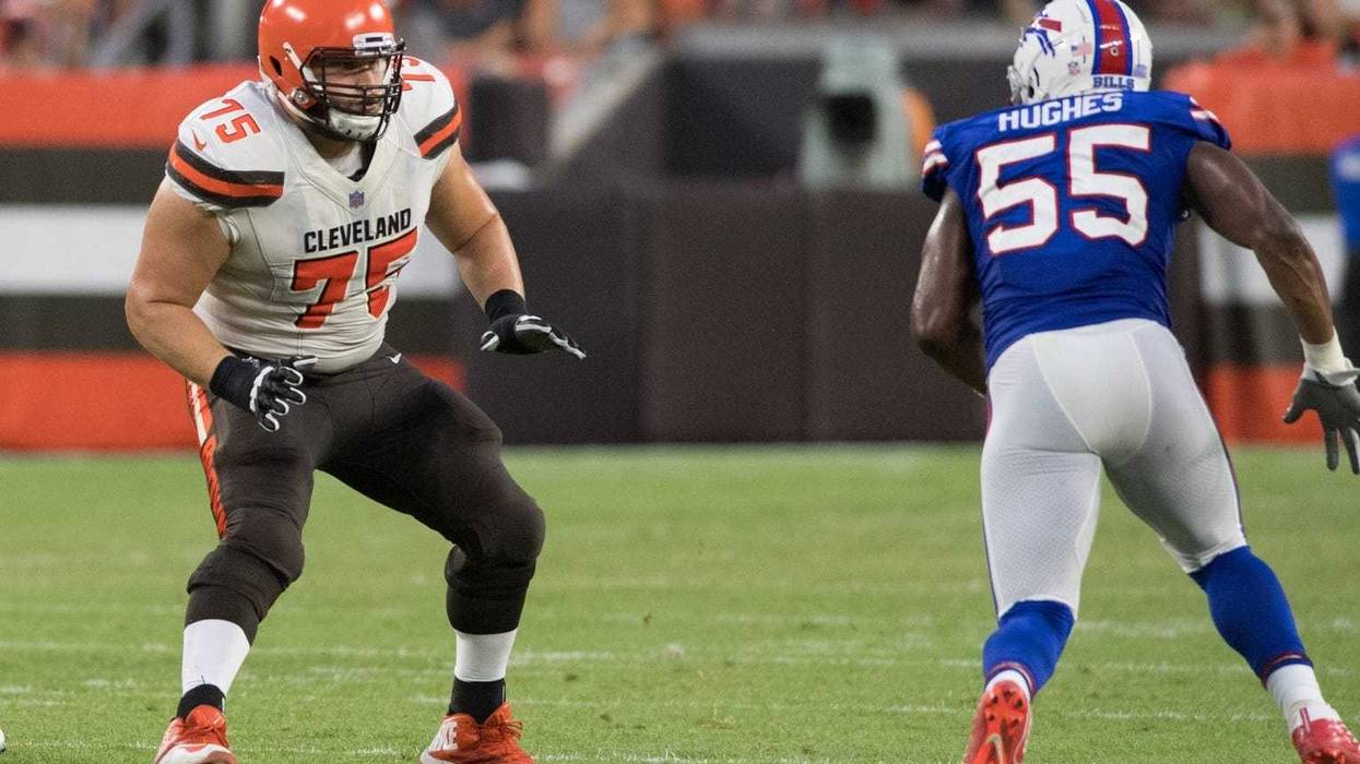 Cleveland Browns offensive tackle Joel Bitonio (75) and Buffalo Bills defensive end Jerry Hughes (55) at FirstEnergy Stadium.