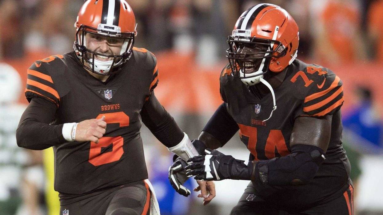 Cleveland Browns quarterback Baker Mayfield (6) and offensive guard Chris Hubbard (74) celebrate after a two-point conversion during the third quarter against the New York Jets at FirstEnergy Stadium.