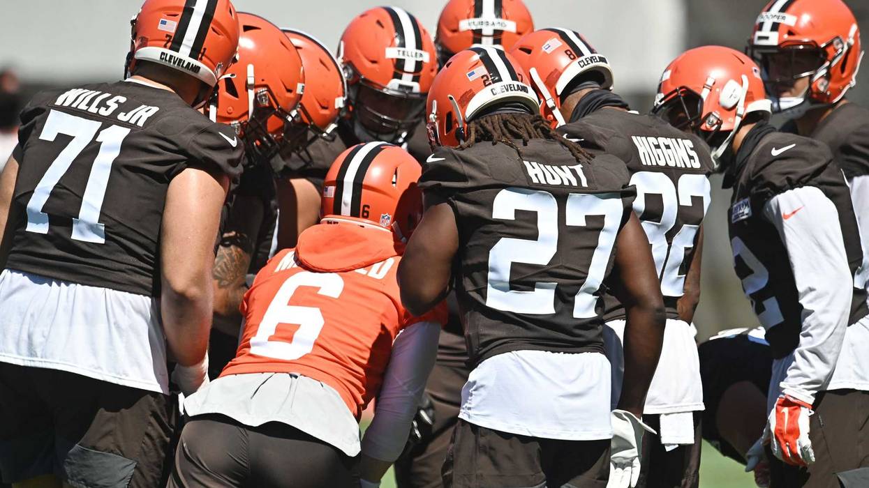 Cleveland Browns quarterback Baker Mayfield relays a play to the offense during training camp at the Cleveland Browns training facility.
