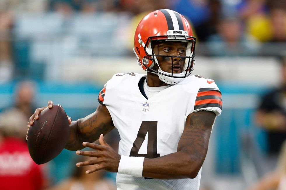 Cleveland Browns quarterback Deshaun Watson (4) looks to throw the ball during the first quarter of a preseason game against the Jacksonville Jaguars at TIAA Bank Field.