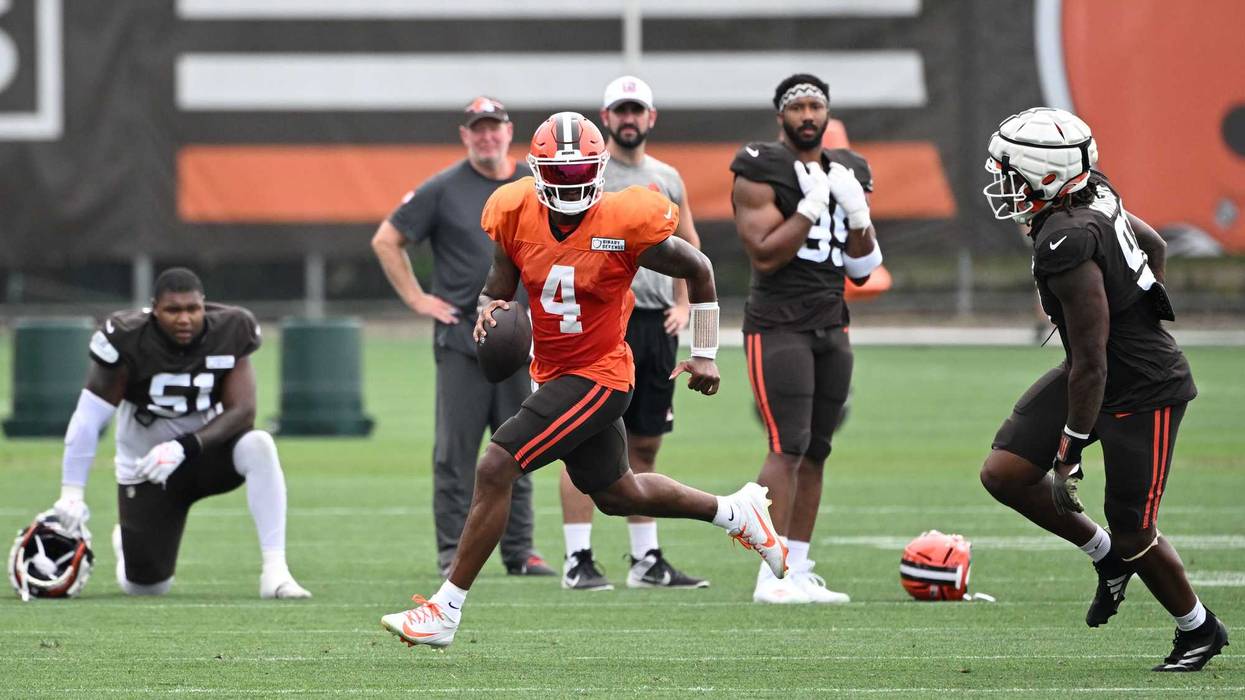 Cleveland Browns quarterback Deshaun Watson (4) rolls out during practice at the Browns training facility in Berea, Ohio.