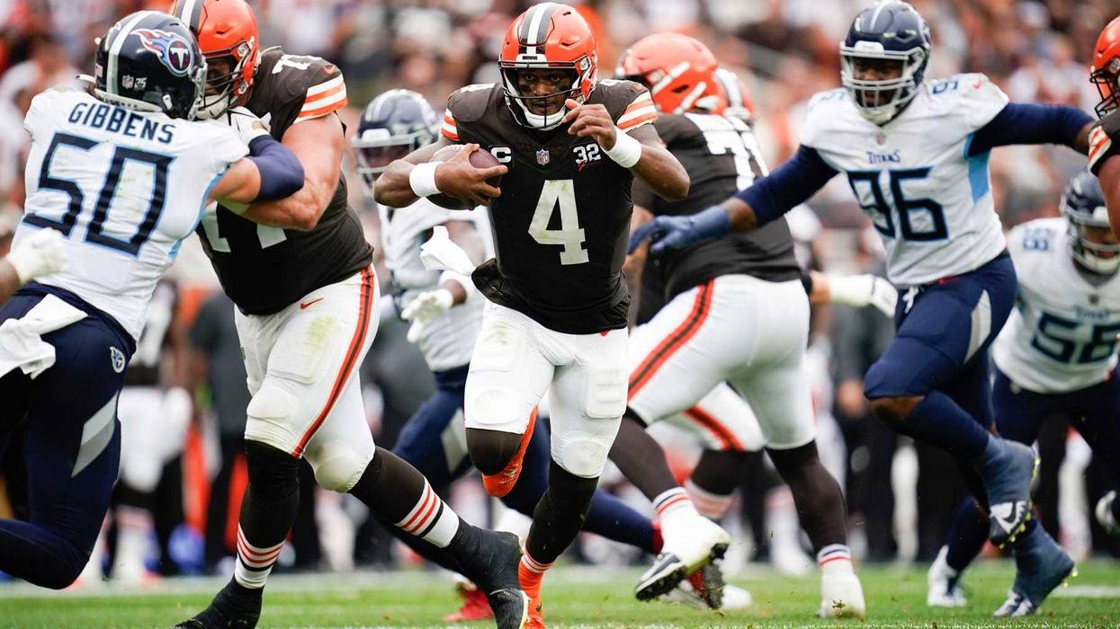 Cleveland Browns quarterback Deshaun Watson (4) runs the ball during the third quarter against the Tennessee Titans at Cleveland Browns Stadium.