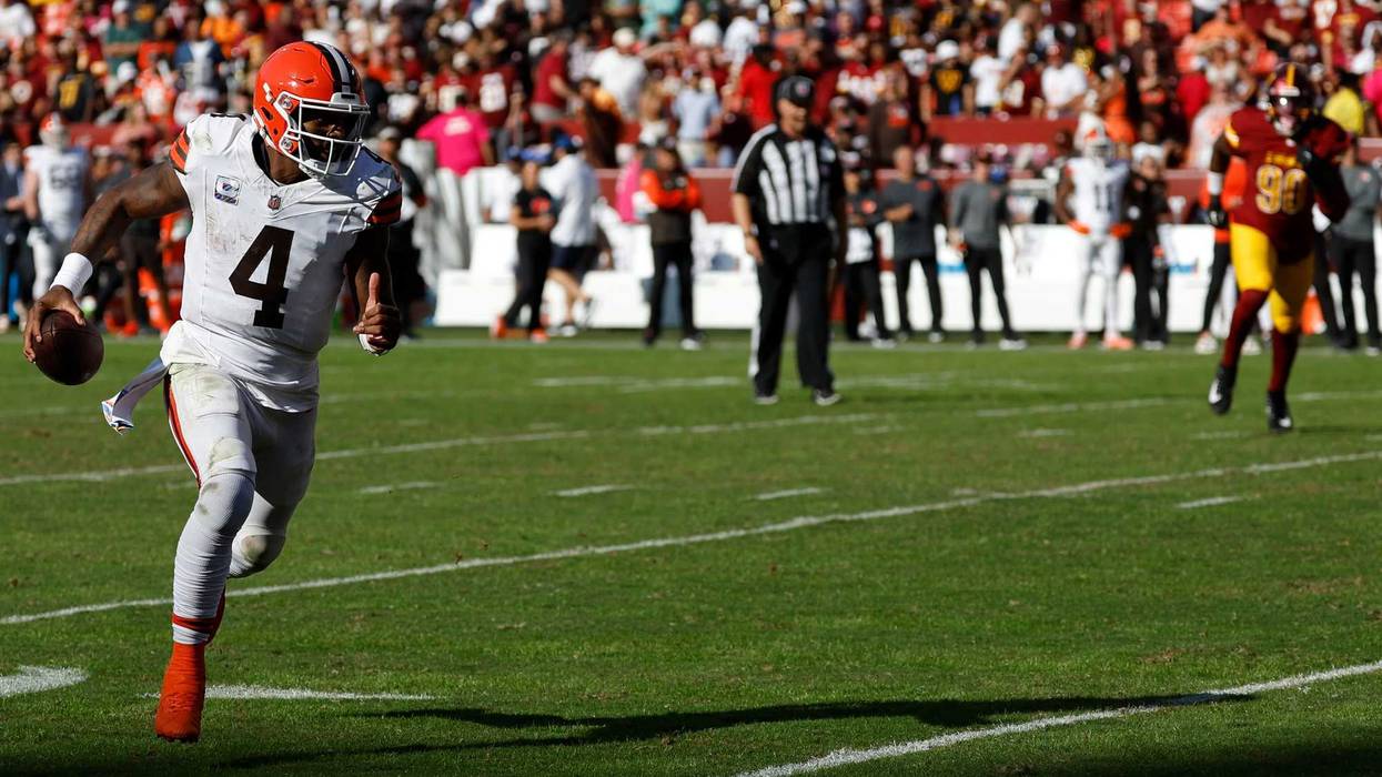 Cleveland Browns quarterback Deshaun Watson (4) runs with the ball against the Washington Commanders during the fourth quarter at NorthWest Stadium.