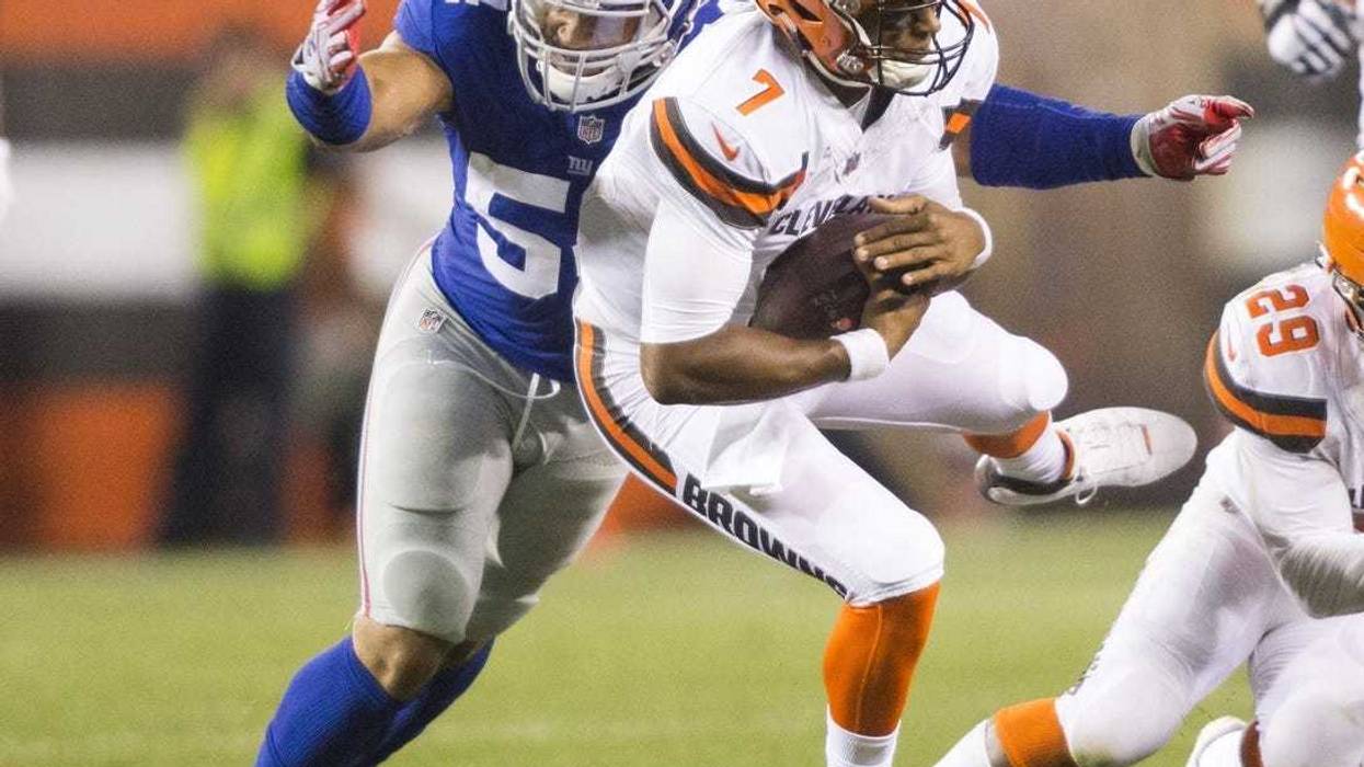 Cleveland Browns quarterback DeShone Kizer (7) is sacked by New York Giants defensive end Olivier Vernon (54) during the second quarter at FirstEnergy Stadium.