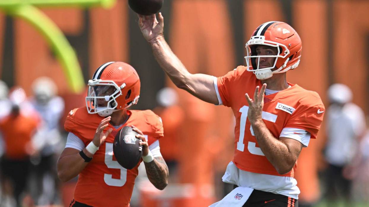 Cleveland Browns quarterback Dillon Gabriel (5) and quarterback Joe Flacco (15) throw passes during training camp at CrossCountry Mortgage Campus.