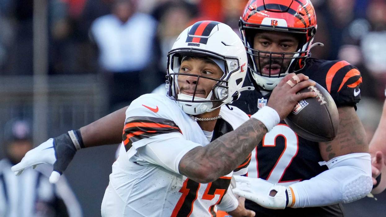 Cleveland Browns quarterback Dorian Thompson-Robinson (17) evades Cincinnati Bengals defensive tackle B.J. Hill (92) in the fourth quarter of the NFL Week 16 game between the Cincinnati Bengals and the Cleveland Browns at Paycor Stadium in downtown Cincinnati on Sunday, Dec. 22, 2024. The Bengals won 24-16.