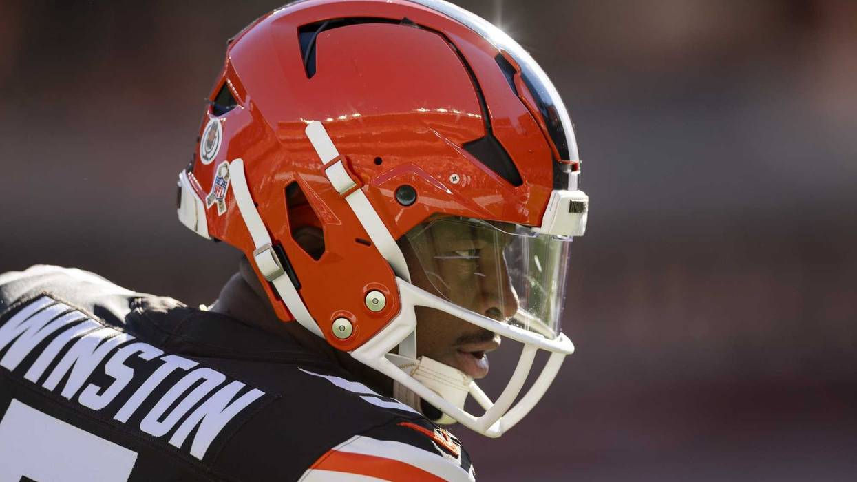 Cleveland Browns quarterback Jameis Winston (5) pumps up his teammates during warm ups before the game against the Los Angeles Chargers at Huntington Bank Field.