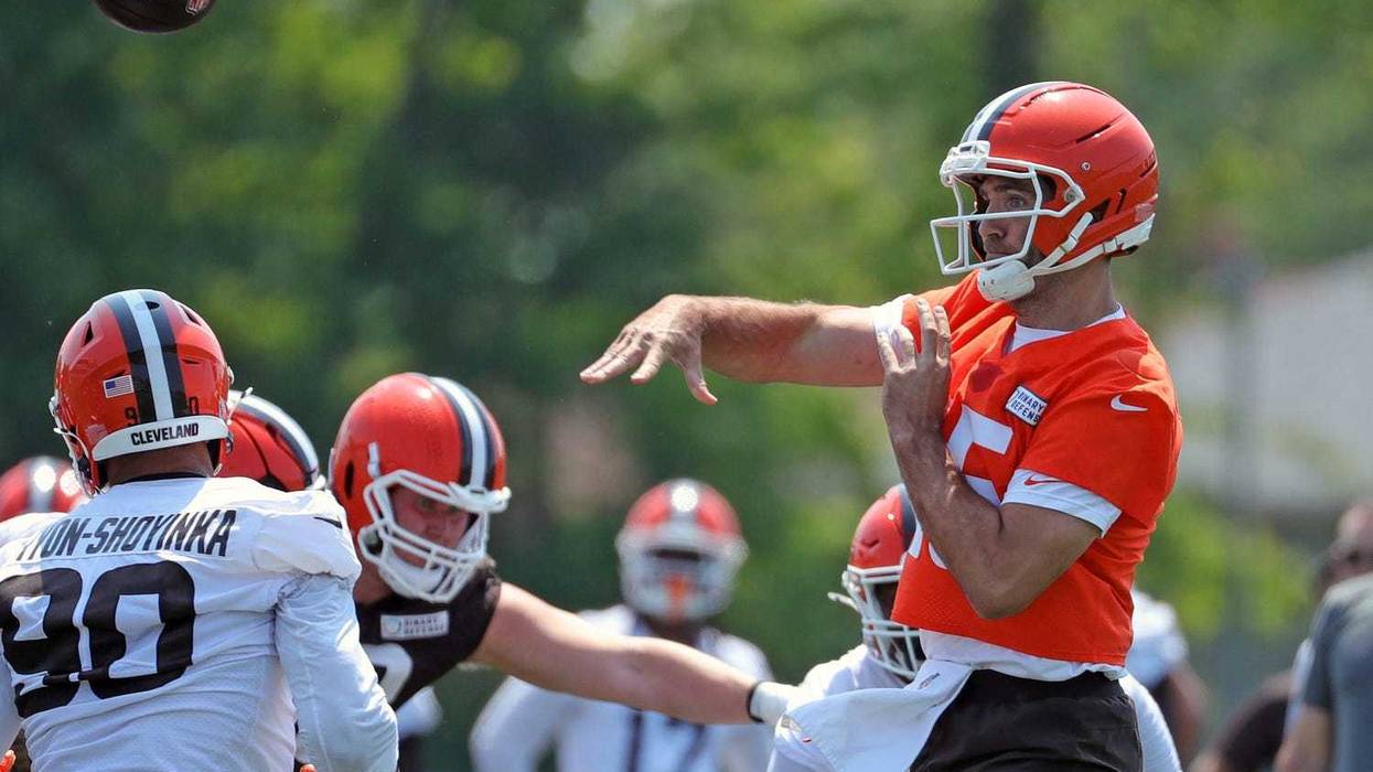 Cleveland Browns quarterback Joe Flacco (15) throws over defensive end Joe Tryon-Shoyinka (90) during practice at NFL minicamp, Wednesday, June 11, 2025, in Berea, Ohio.