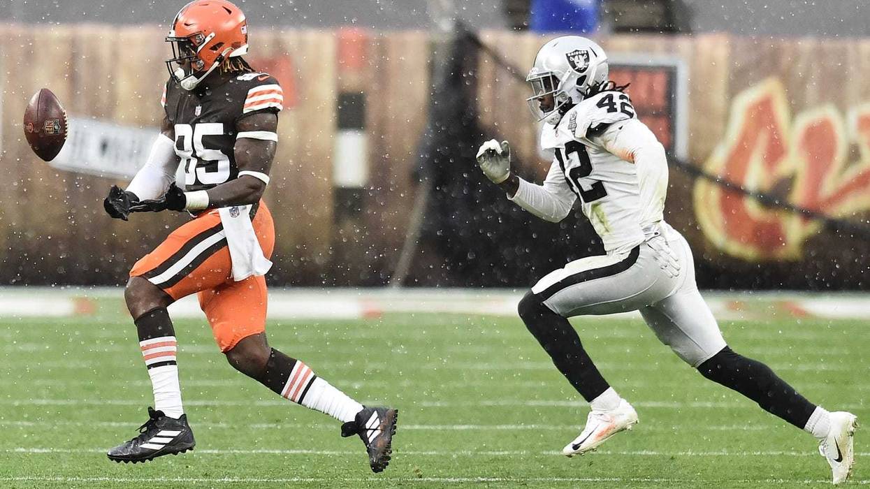 Cleveland Browns tight end David Njoku (85) drops a pass as Las Vegas Raiders inside linebacker Cory Littleton (42) defends during the second half at FirstEnergy Stadium.