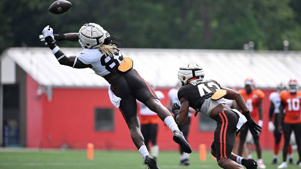 Cleveland Browns tight end David Njoku (85) is unable to make the catch as linebacker Mohamoud Diabate (43) defends during practice at the Browns training facility in Berea, Ohio.