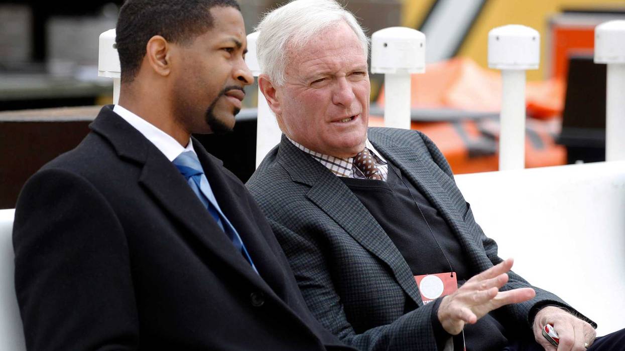 Cleveland Browns vice president Andrew Berry (L) talks with Browns owner Jimmy Haslam (R) on the bench before the Browns play the Pittsburgh Steelers at Heinz Field