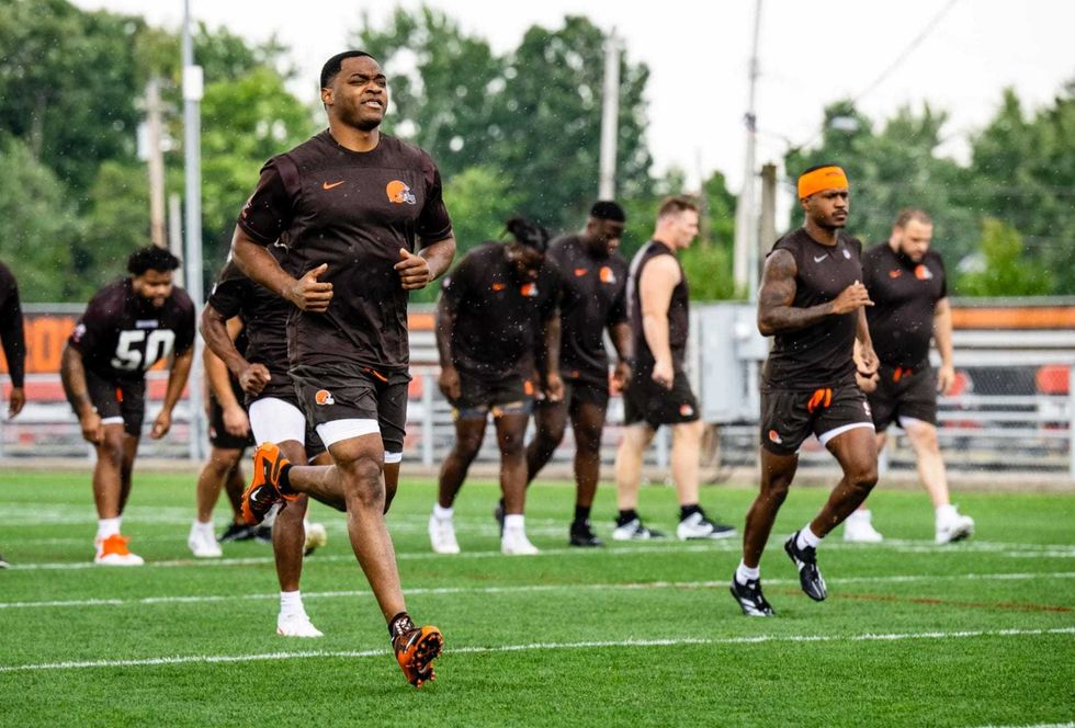 Cleveland Browns wide receiver Amari Cooper runs during a conditioning test with teammates after reporting for training camp on July 23, 2024 at the team