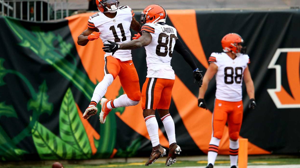Cleveland Browns wide receiver Donovan Peoples-Jones (11), left, celebrates a go-ahead touchdown catch with Cleveland Browns wide receiver Jarvis Landry (80) during the fourth quarter of a Week 7 NFL football game against the Cincinnati Bengals, Sunday, O