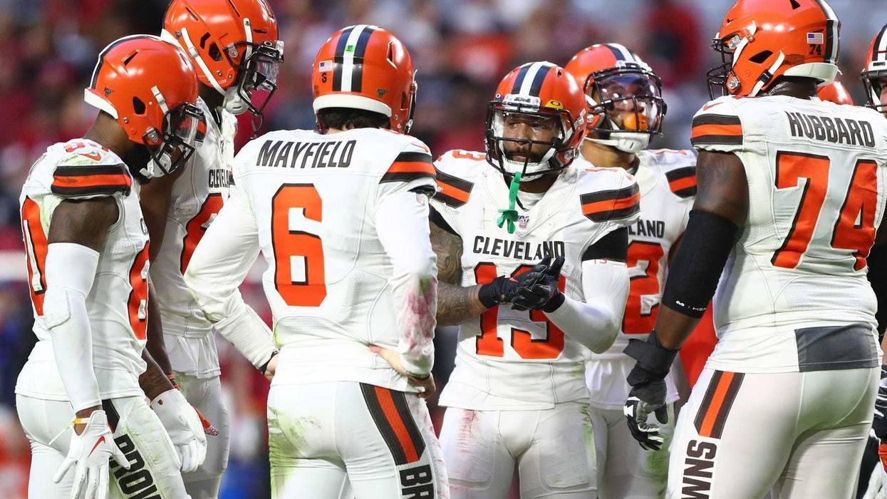 Cleveland Browns wide receiver Odell Beckham Jr. (13) in the huddle with quarterback Baker Mayfield (6) against the Arizona Cardinals at State Farm Stadium.