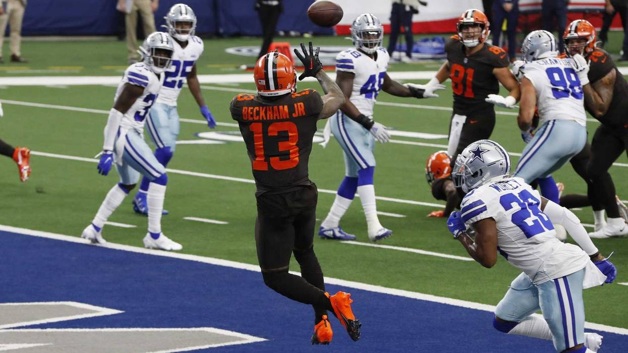 Cleveland Browns wide receiver Odell Beckham Jr. catches a touchdown pass against Dallas Cowboys cornerback Daryl Worley in the second quarter at AT&T Stadium.
