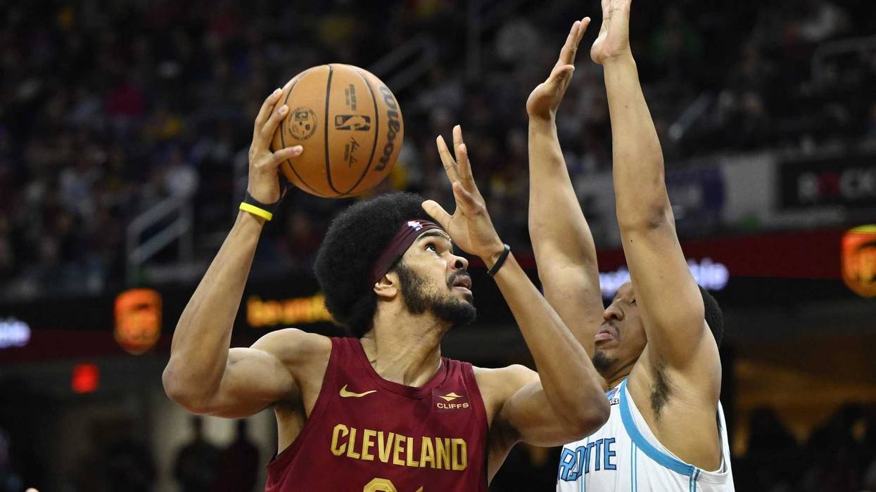 Cleveland Cavaliers center Jarrett Allen (31) shoots beside Charlotte Hornets forward Grant Williams (2) in the second quarter at Rocket Mortgage FieldHouse.