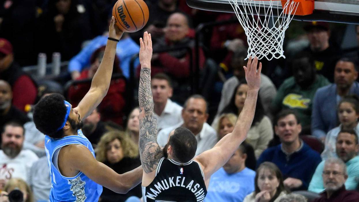 Cleveland Cavaliers center Jarrett Allen (31) shoots beside San Antonio Spurs forward Sandro Mamukelashvili (54) in the fourth quarter at Rocket Arena.
