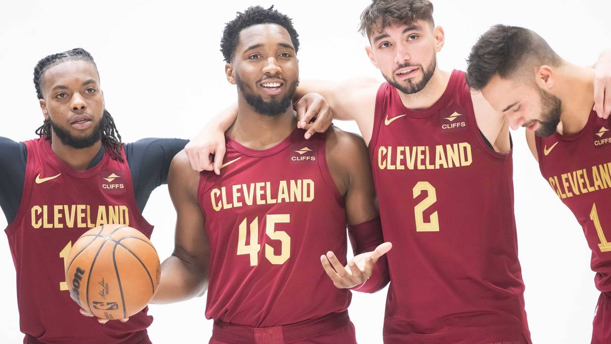 Cleveland Cavaliers Donovan Mitchell (45), Ty Jerome (2), Darius Garland (10) and guard Max Strus (1) pose for a photo during media day