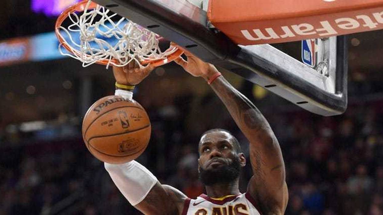Cleveland Cavaliers forward LeBron James celebrates after drawing foul against the Boston Celtics during the fourth quarter in Game 7 of the Eastern Conference finals on May 27, 2018, at TD Garden in Boston.