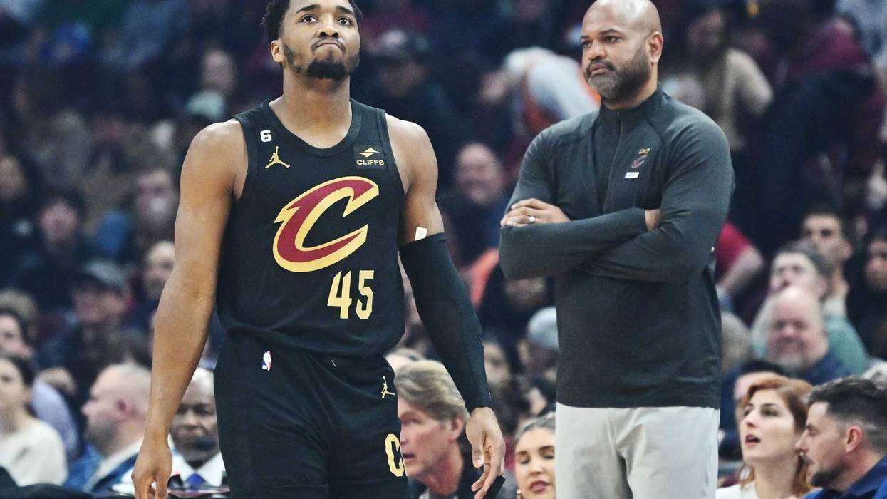 Cleveland Cavaliers guard Donovan Mitchell (45) and head coach J.B. Bickerstaff react after a foul during the first quarter against the Boston Celtics at Rocket Mortgage FieldHouse.