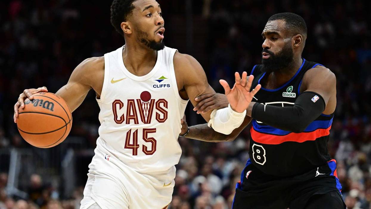 Cleveland Cavaliers guard Donovan Mitchell (45) drives to the basket against Detroit Pistons forward Tim Hardaway Jr. (8) during the second half at Rocket Mortgage FieldHouse.