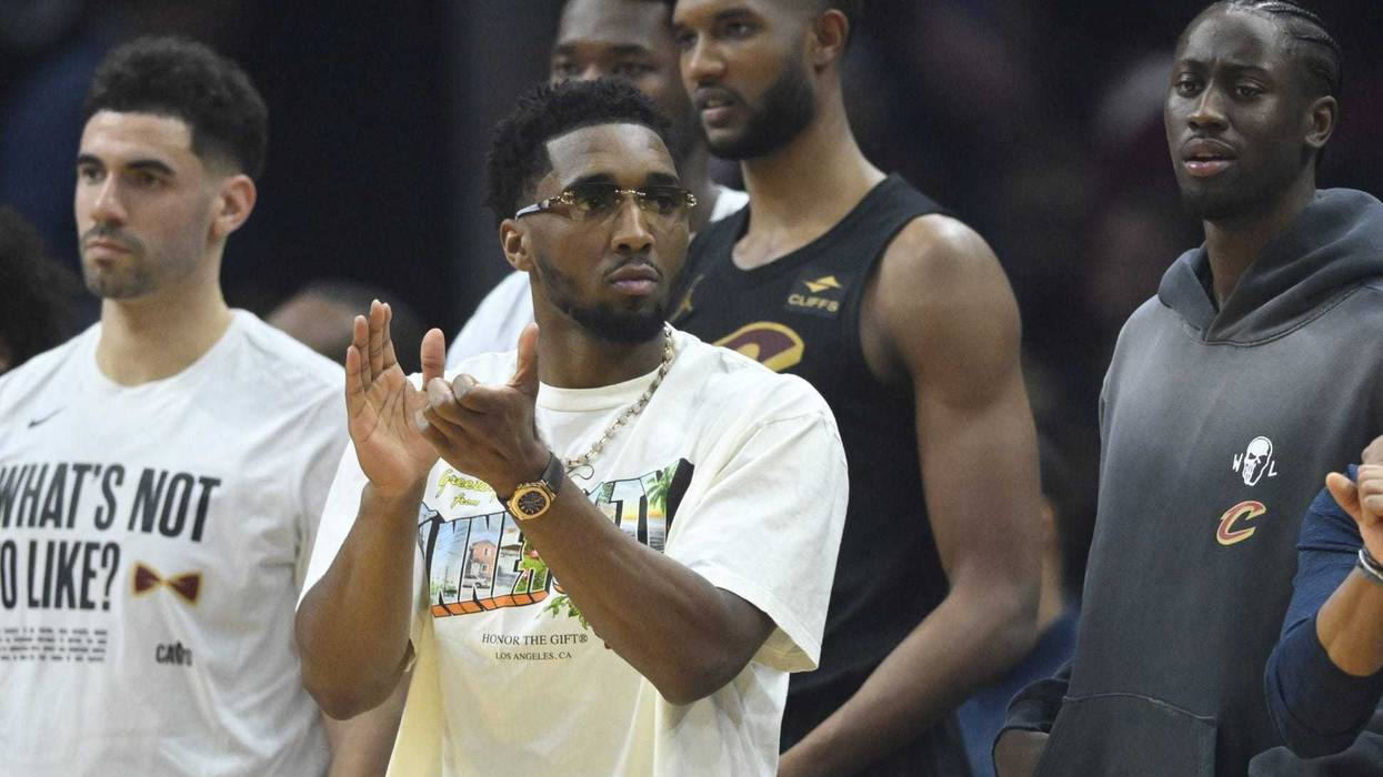 Cleveland Cavaliers guard Donovan Mitchell (front) reacts in the second quarter against the New York Knicks at Rocket Mortgage FieldHouse.