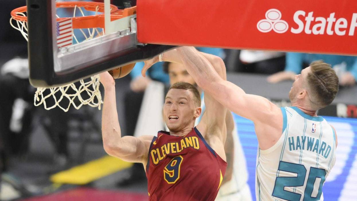 Cleveland Cavaliers guard Dylan Windler (9) moves to the basket against Charlotte Hornets forward Gordon Hayward (20) in the third quarter at Rocket Mortgage FieldHouse.
