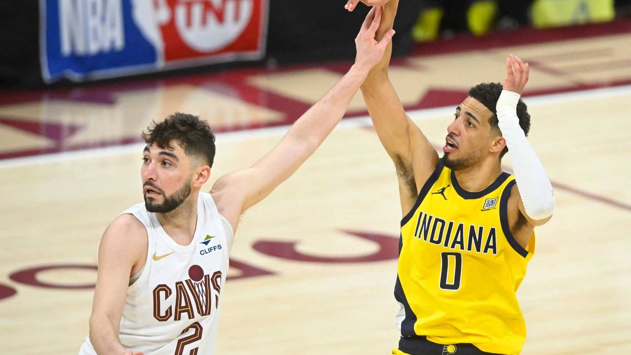 Cleveland Cavaliers guard Ty Jerome (2) defends Indiana Pacers guard Tyrese Haliburton (0) on a follow through for a game-winning three-point basket in the fourth quarter during game two of the second round of the 2025 NBA Playoffs at Rocket Arena.