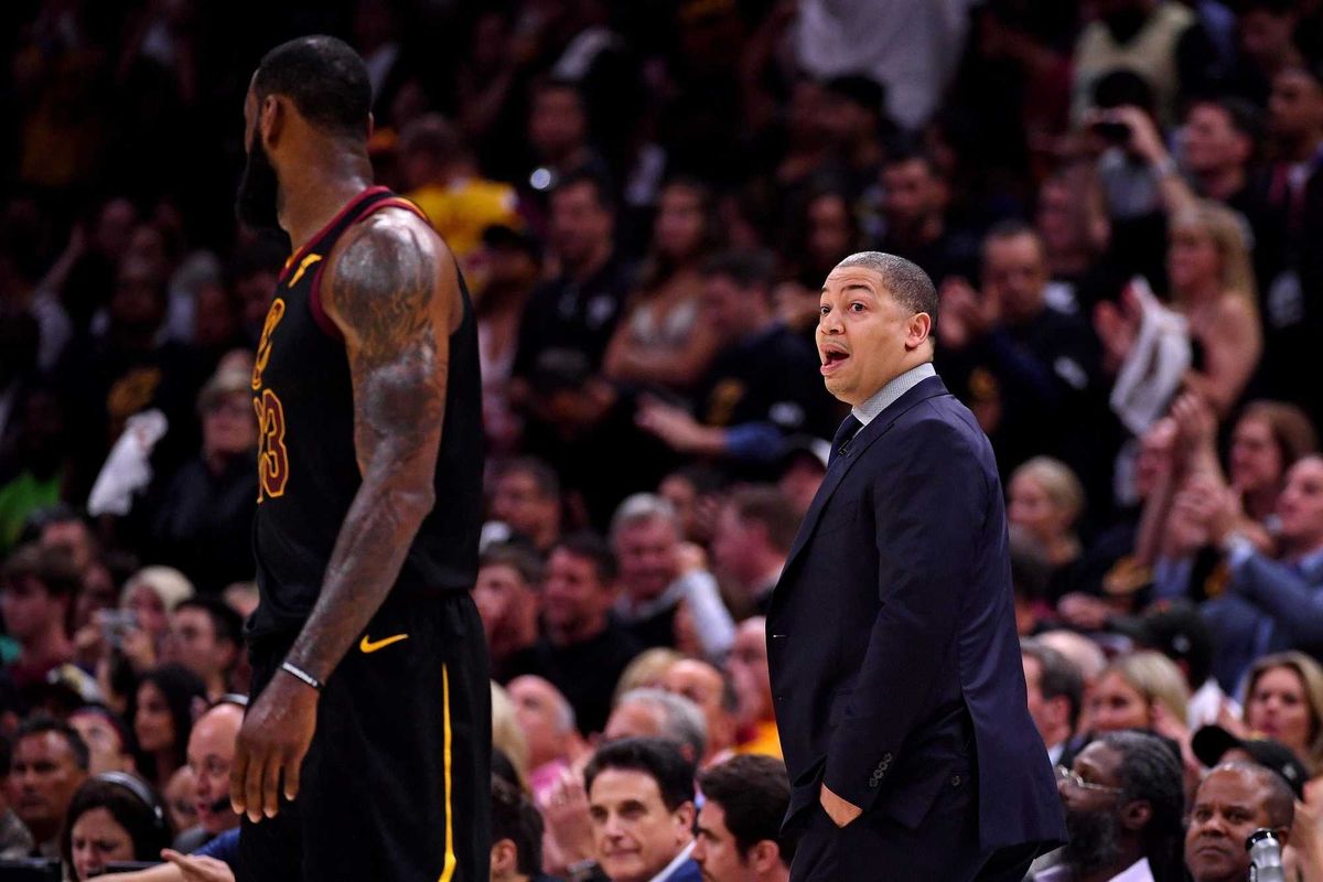 Cleveland Cavaliers head coach Tyronn Lue talks with forward LeBron James (23) during the second quarter against the Golden State Warriors in game four of the 2018 NBA Finals at Quicken Loans Arena.