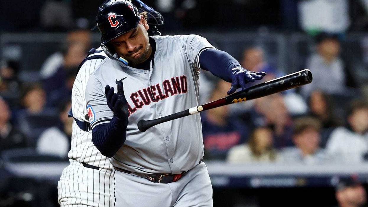 Cleveland Guardians first base Josh Naylor (22) reacts after hitting an RBI sacrifice fly during the fifth inning against the New York Yankees in game two of the ALCS for the 2024 MLB Playoffs at Yankee Stadium.
