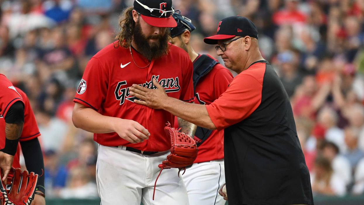 Cleveland Guardians manager Terry Francona relieves starting pitcher Hunter Gaddis (70) during the fourth inning against the Houston Astros at Progressive Field.