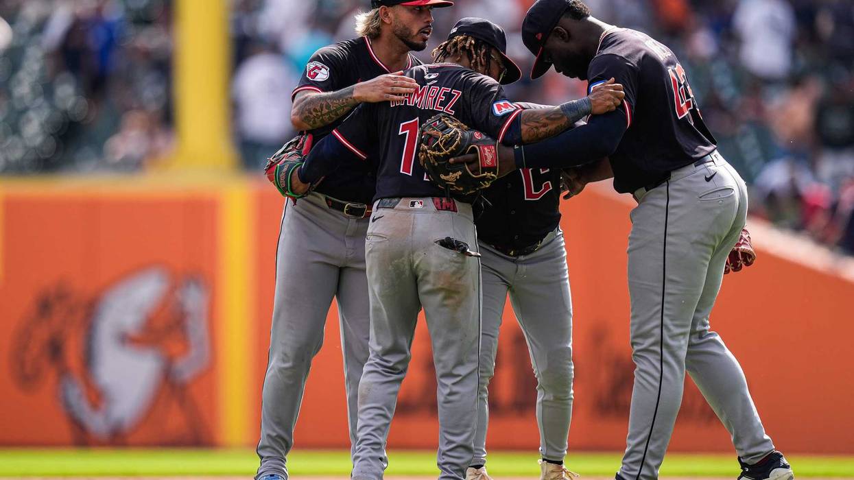 Cleveland Guardians players huddle after 3-1 win over Detroit Tigers at Comerica Park in Detroit on Thursday, Sept. 18, 2025.