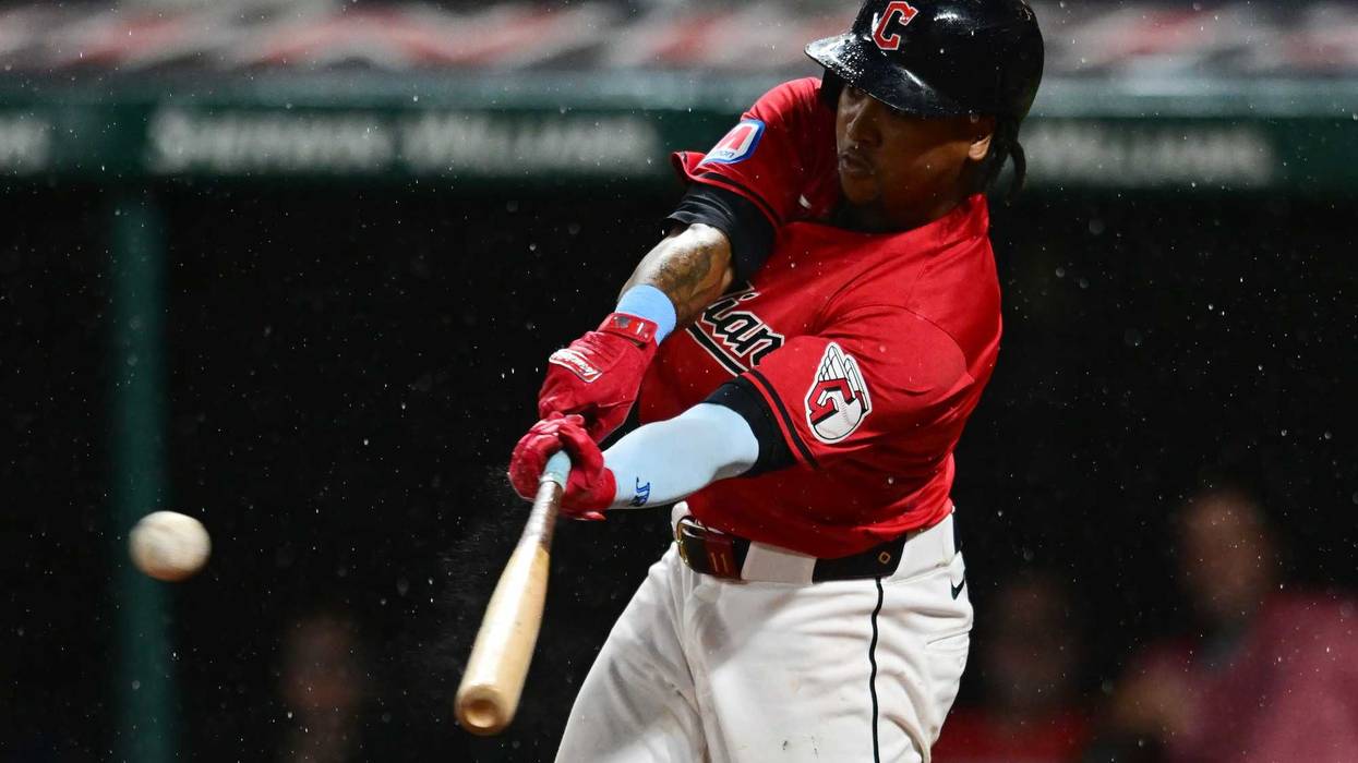 Cleveland Guardians third baseman Jose Ramirez (11) hits a double during the eighth inning against the Houston Astros at Progressive Field.