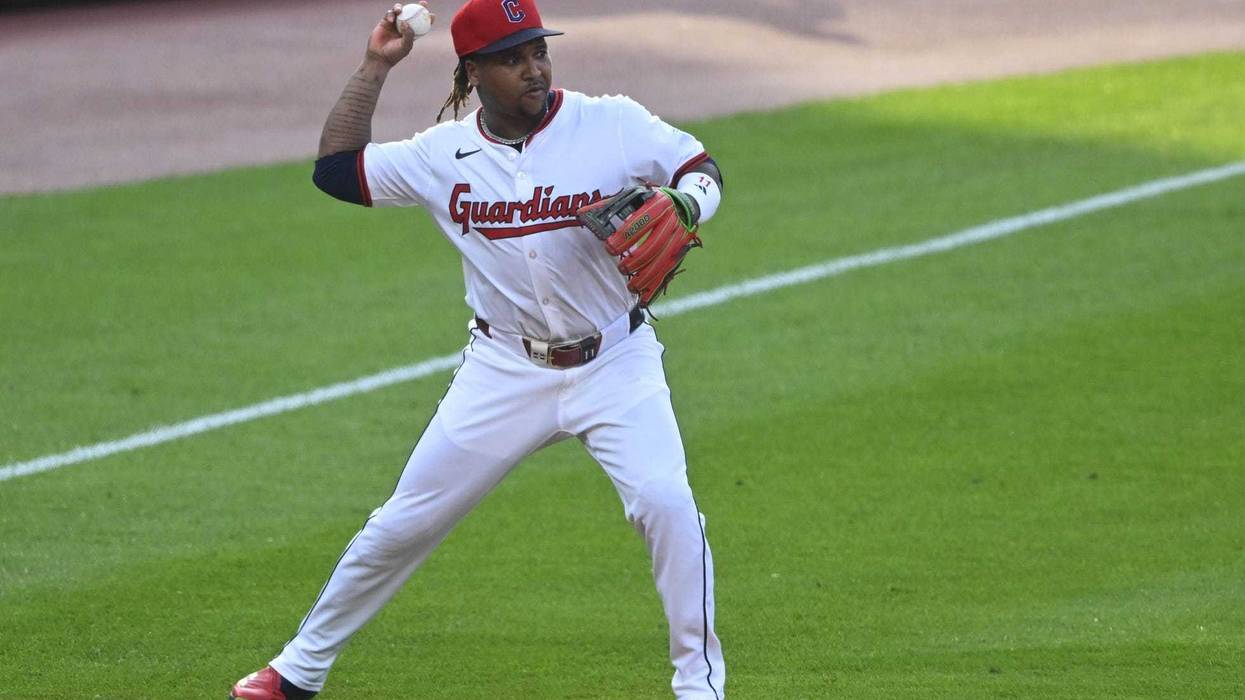 Cleveland Guardians third baseman Jose Ramirez (11) throws to second base in the third inning against the Toronto Blue Jays at Progressive Field.