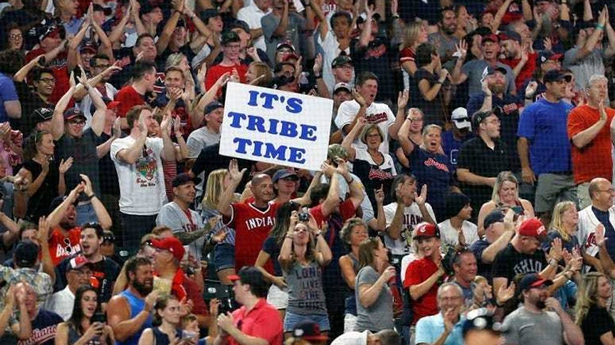 Cleveland Indians fans cheer against the Philadelphia Phillies