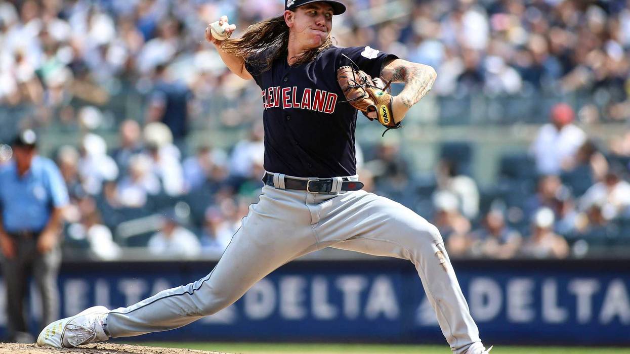 Cleveland Indians pitcher Mike Clevinger (52) pitches in the fourth inning against the New York Yankees at Yankee Stadium.