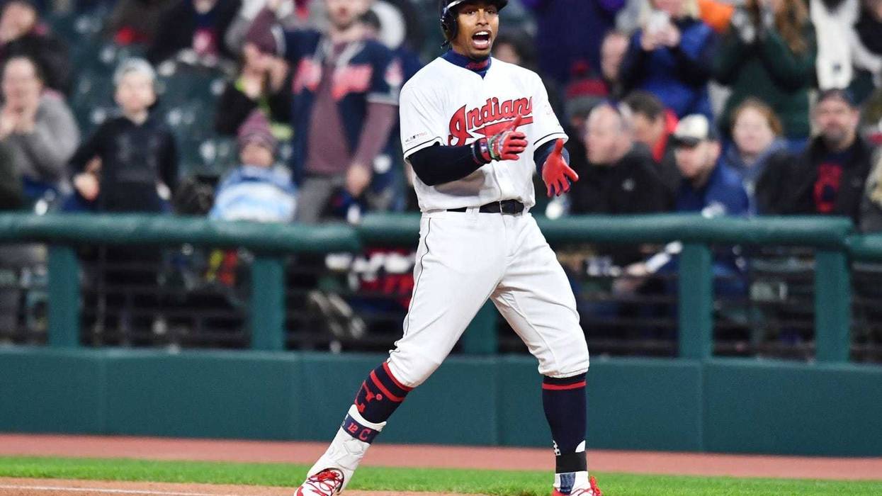 Cleveland Indians shortstop Francisco Lindor (12) celebrates after hitting a single during the second inning against the Atlanta Braves at Progressive Field.