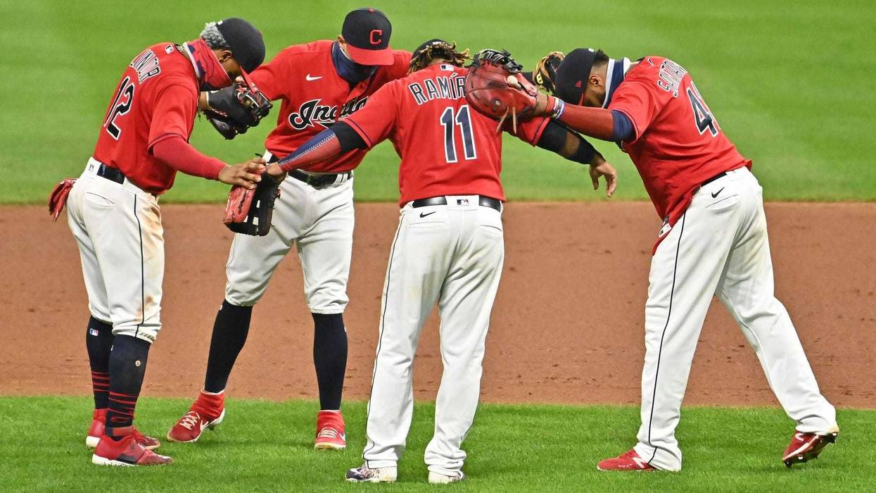 Cleveland Indians shortstop Francisco Lindor, second baseman Cesar Hernandez, third baseman Jose Ramirez and first baseman Carlos Santana