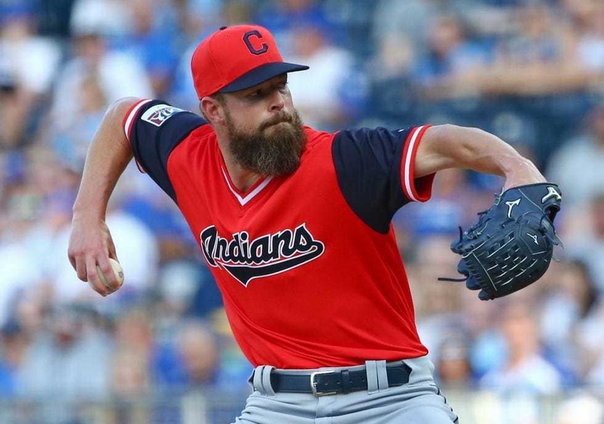 Cleveland Indians starting pitcher Corey Kluber (28) throws a pitch during the first inning against the Kansas City Royals at Kauffman Stadium.