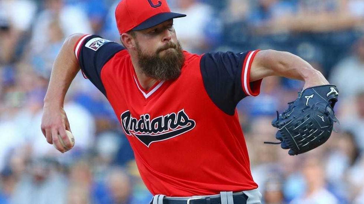 Cleveland Indians starting pitcher Corey Kluber (28) throws a pitch during the first inning against the Kansas City Royals at Kauffman Stadium.