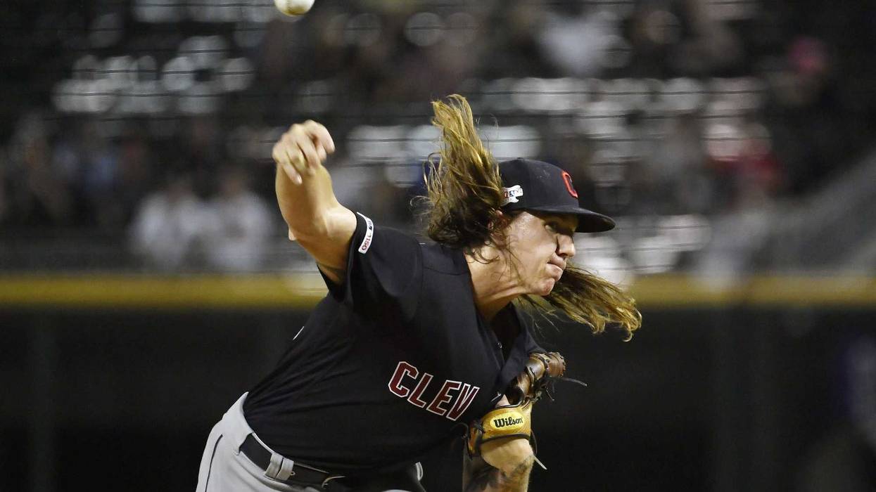 Cleveland Indians starting pitcher Mike Clevinger (52) delivers the ball in the first inning against the Chicago White Sox at Guaranteed Rate Field.