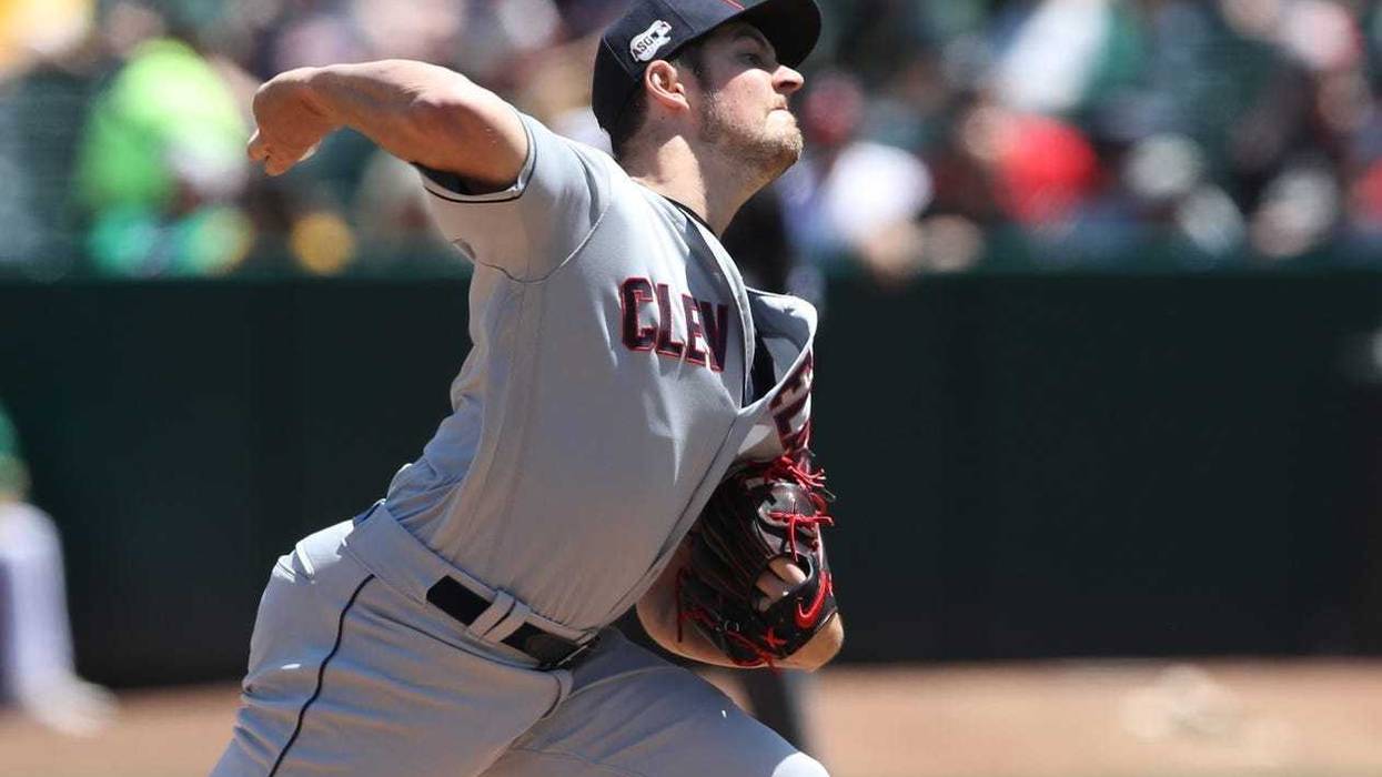 Cleveland Indians starting pitcher Trevor Bauer (47) throws a pitch during the second inning against the Oakland Athletics at Oakland Coliseum.