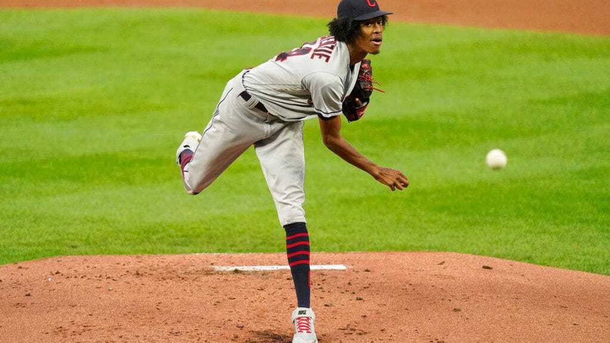 Cleveland Indians starting pitcher Triston McKenzie throws during the first inning