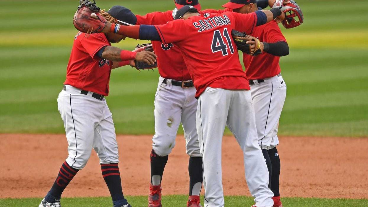 Cleveland Indians third baseman Jose Ramirez short stop Francisco Lindor second basemen Cesar Hernandez and first basemen Carlos Santana celebrate after the Indians defeated the Pittsburgh Pirates at Progressive Field