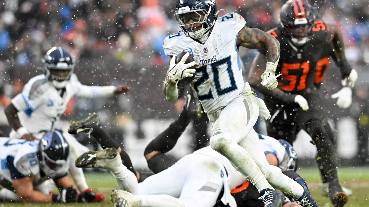 CLEVELAND, OHIO - DECEMBER 07: Tony Pollard #20 of the Tennessee Titans runs for a touchdown during the third quarter against the Cleveland Browns at Huntington Bank Field on December 07, 2025 in Cleveland, Ohio. (Photo by Nick Cammett/Getty Images)