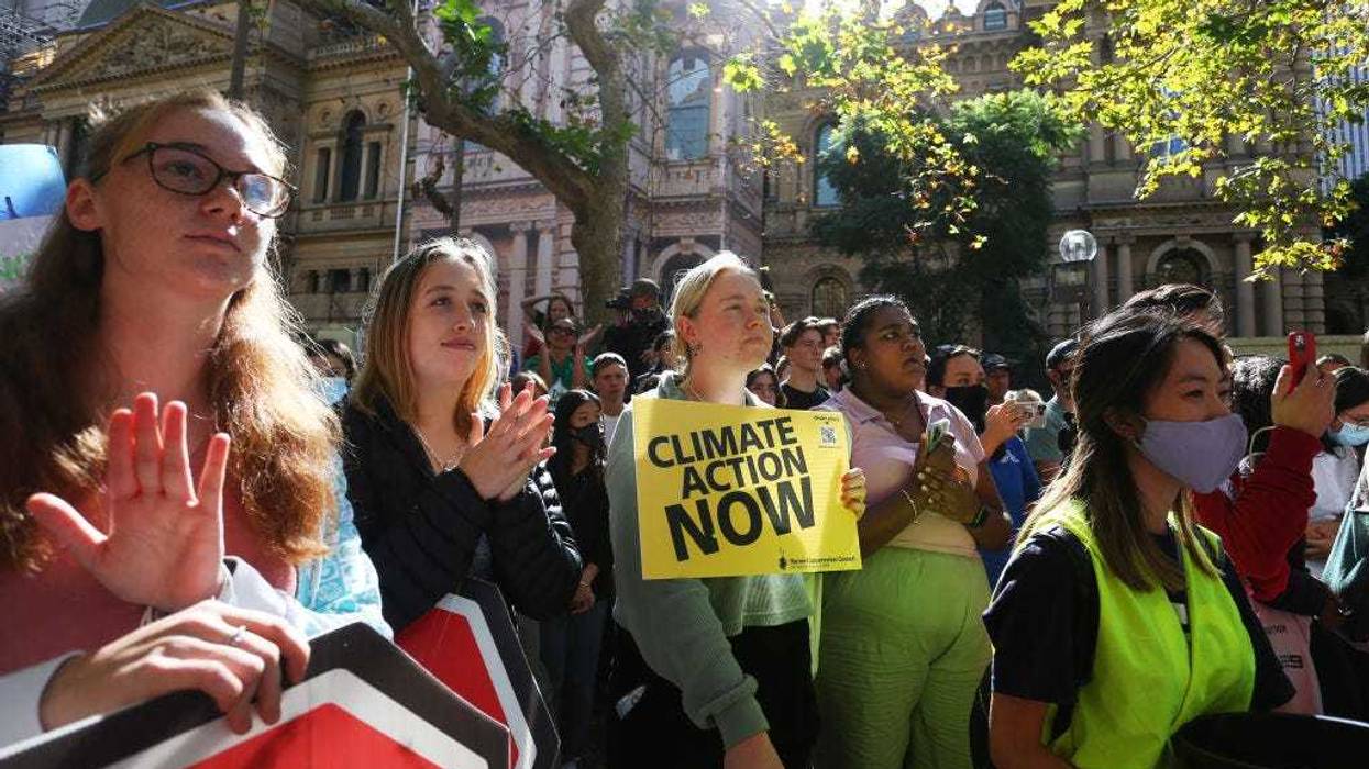 Climate activists gather during the 'School Strike 4 Climate' at Town Hall on May 06, 2022 in Sydney, Australia.