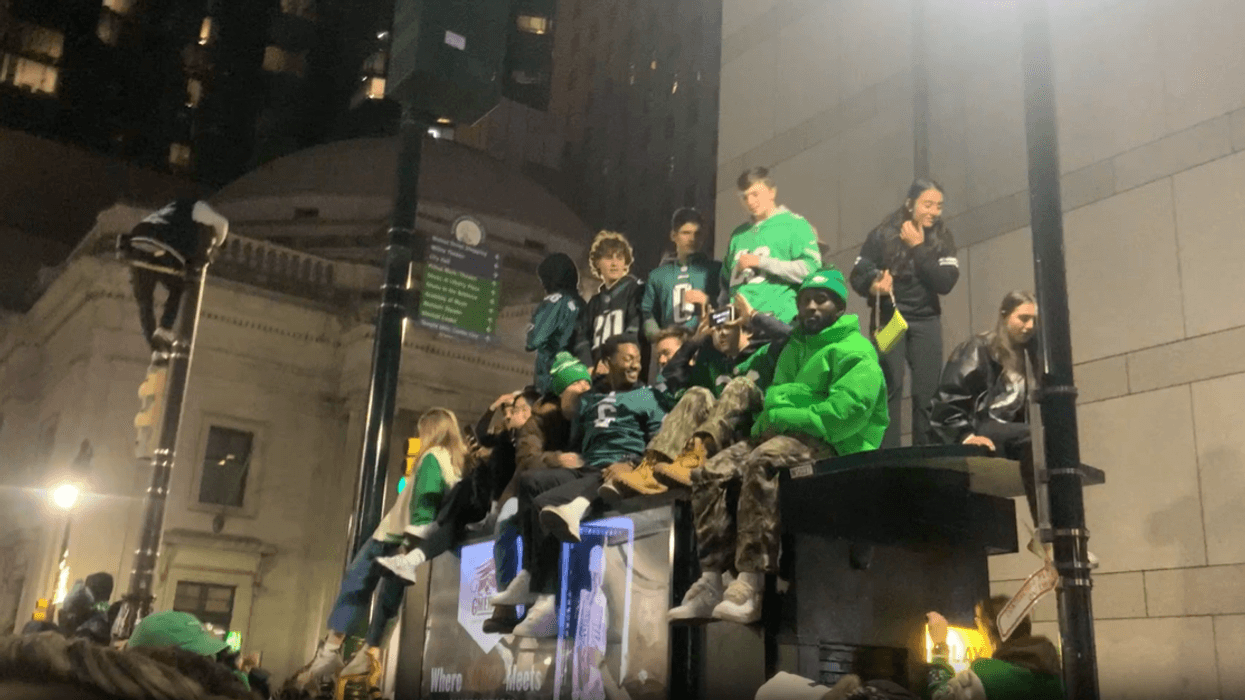 Climbing a bus shelter, Jan. 26, 2025