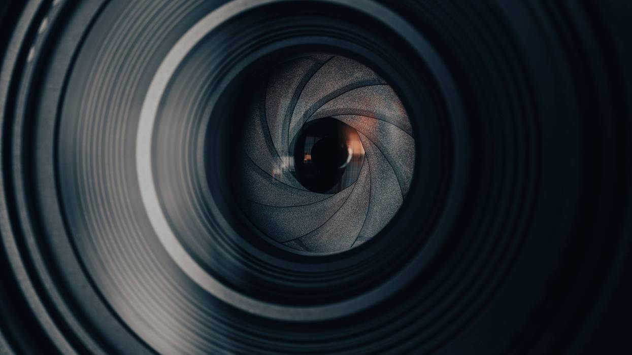 Close up of camera lens aperture blades with inner glass reflection,Macro